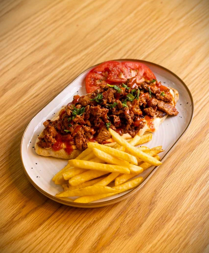 <i>Γυρλού μερίδα με χοιρινό</i><i></i>