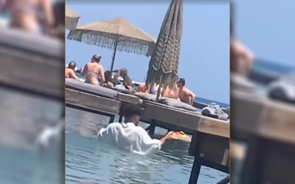 Παρέμβαση Άδωνι Γεωργιάδη για εργαζόμενο που σχεδόν κολυμπάει για να σερβίρει πελάτες!