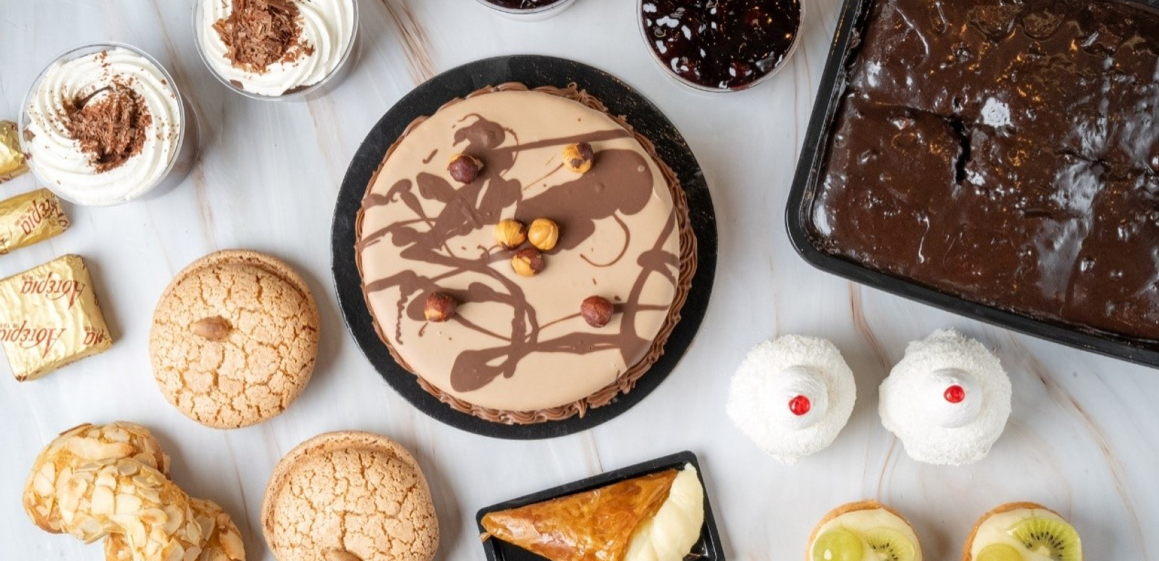 Ζαχαροπλαστείο Αστέρια: Γλυκές απολαύσεις πιστές στην παράδοση Ζαχαροπλαστείο Αστέρια: Γλυκές απολαύσεις πιστές στην παράδοση